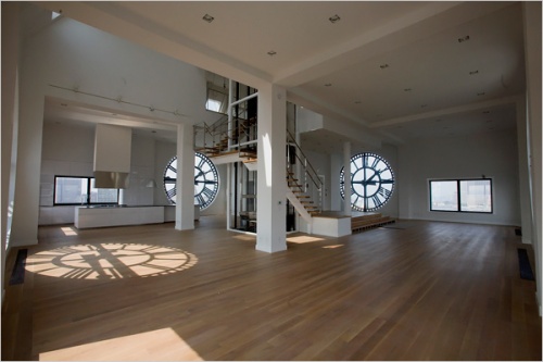 An areal view of the Clocktower Penthouse. The lightstream of the clock on the floor is amazing!